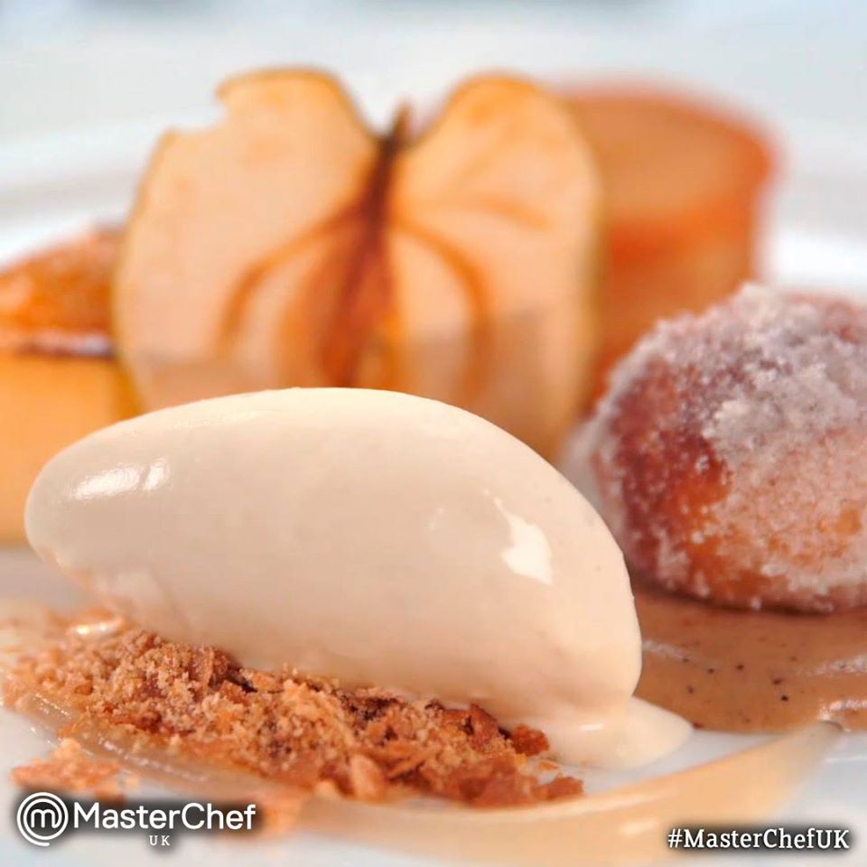 Another great dessert from Craig (the previous dessert image was his too) at MasterChef UK. Ice cream in the foreground. Behind it, the thinnest slice of an apple as decoration, next to a donut. In the background, there seems to be one piece of caramel custard and a muffin. There's apple sauce. It looks like heaven. I'm hungry.